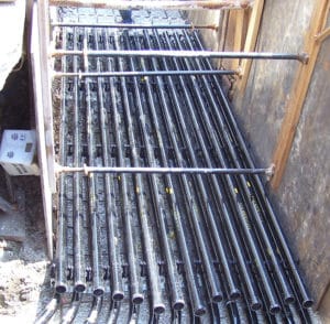 Champion Fiberglass RTRC conduit installed in an excavated utility trench for underground electrical distribution.