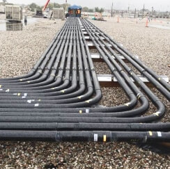 Champion Duct® RTRC fiberglass conduit installed in an industrial facility for indoor and outdoor exposure.